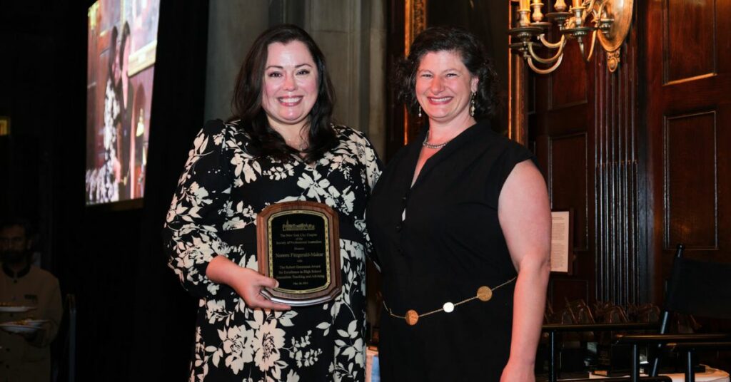 Katina Paron presents Noreen-Fitzgerald-Makar with the 2024 Robert Greenman Award.